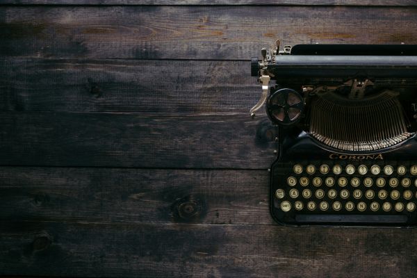 Vintage typewriter on weather wood surface